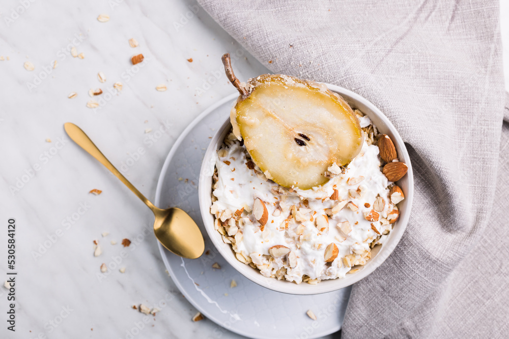 The candied pear in oatmeal with almonds and milk. It's a perfect breakfast.