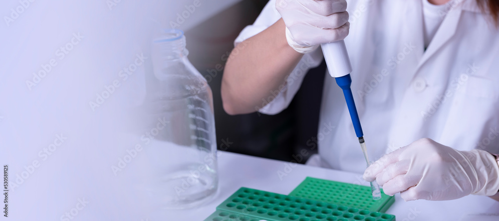 scientist using auto-pipette with Eppendorf consumables tube in the lab,Doing experiment for product,The researchers analyzed to find the results of the experiment. scientist using auto-pipette with Eppendorf consumables tube in the lab,Doing experiment for product,The researchers analyzed to find the results of the experiment.