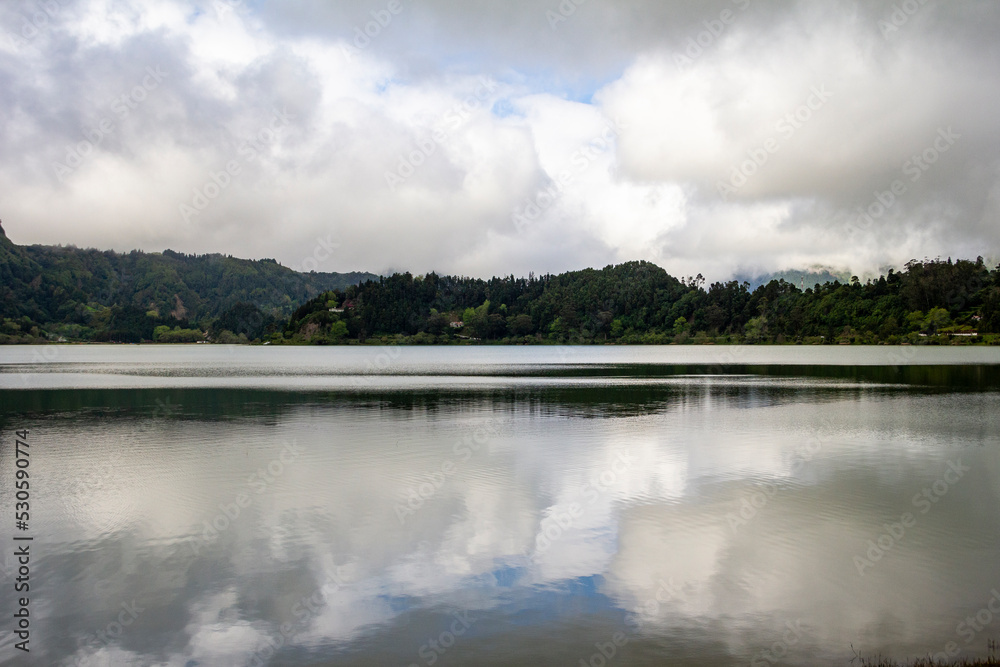 clouds reflection in the mountain lake