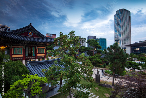 Skyline of Gangnam-gu by the tea house and garden of Bongeunsa Temple  Seoul  South Korea.