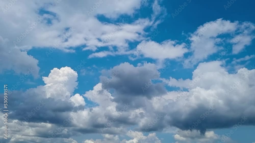 Blue sky white clouds. Puffy fluffy white clouds. Cumulus cloud cloudscape time lapse. Summer blue sky time lapse. Nature weather blue sky. White clouds background. Cloudy time lapse , video loop Blue sky white clouds. Puffy fluffy white clouds. Cumulus cloud cloudscape time lapse. Summer blue sky time lapse. Nature weather blue sky. White clouds background. Cloudy time lapse , video loop