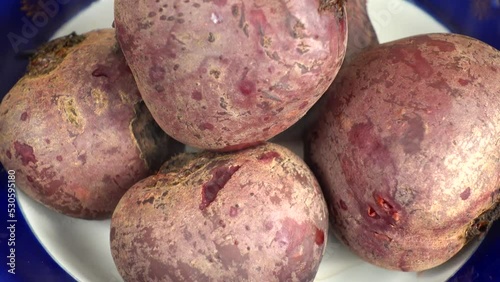 Hot boiled beetroot. Shooting in kitchen. photo