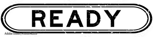 Grunge black ready word rubber seal stamp on white background