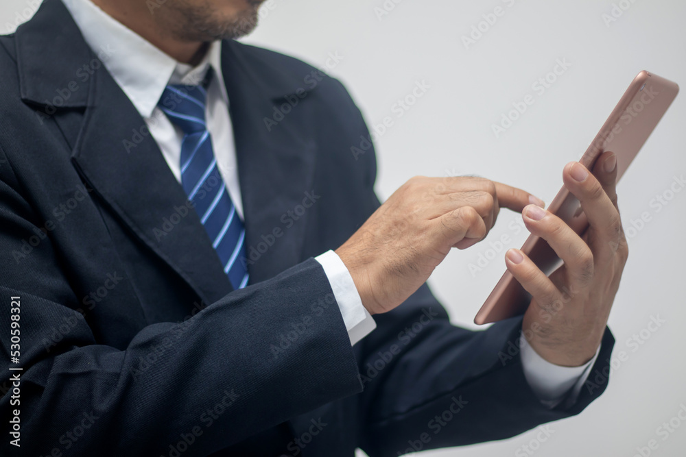 Business people work through tablets for convenience. Business people work through tablets for convenience.