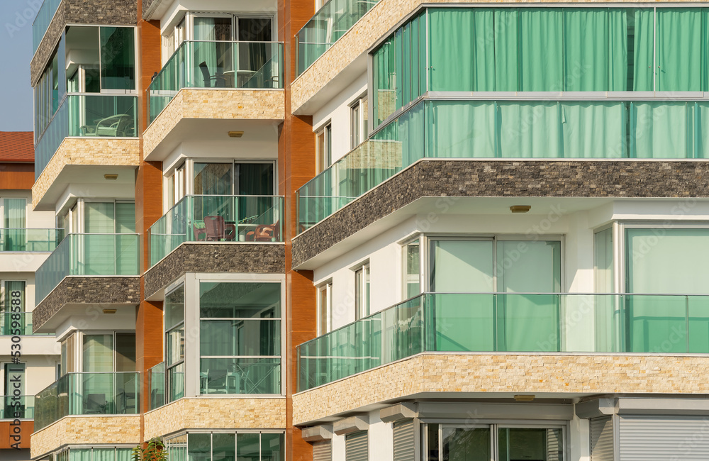 New residential building with panoramic windows. New residential building with panoramic windows.