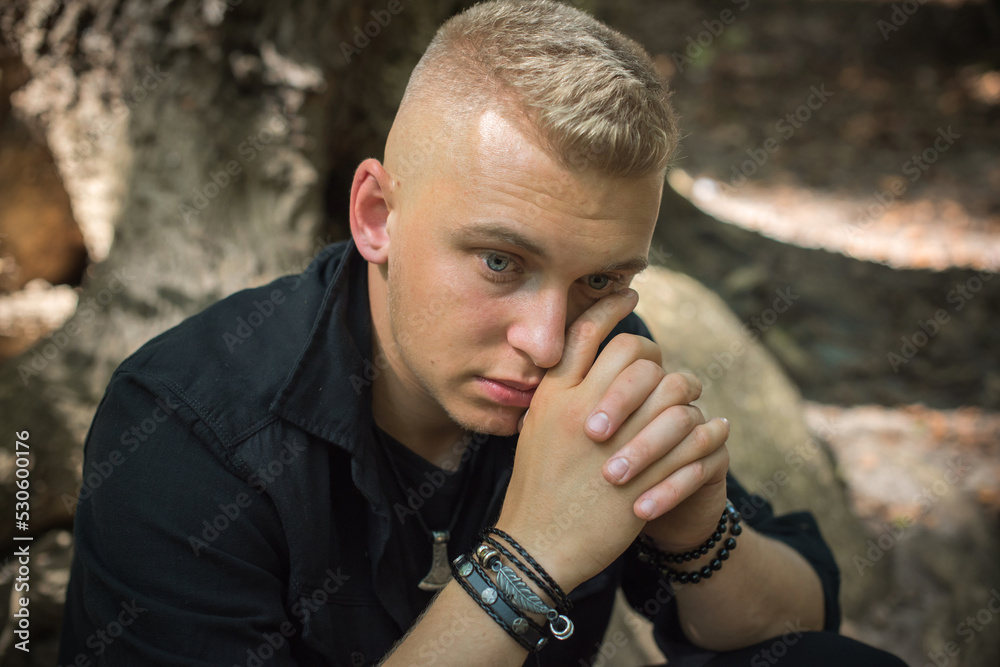 Young blonde Nordic appearance guy, style for youth accessorize for men, casual street style Young blonde Nordic appearance guy, style for youth accessorize for men, casual street style