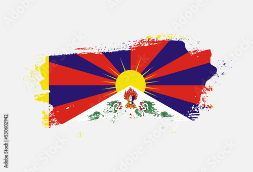 Flag of Tibet country with hand drawn brush stroke vector illustration