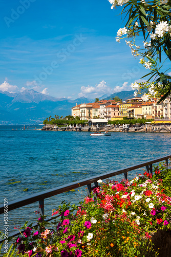 Fototapeta Naklejka Na Ścianę i Meble -  Beautiful coast of lake Como in summer with flowers, famous tourism destination