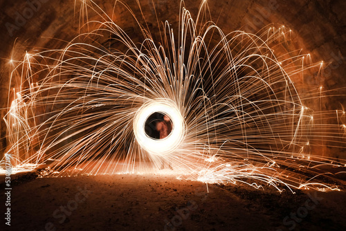 Doing handmade sparks and shooting with a long exposure during a great summer night in Italy