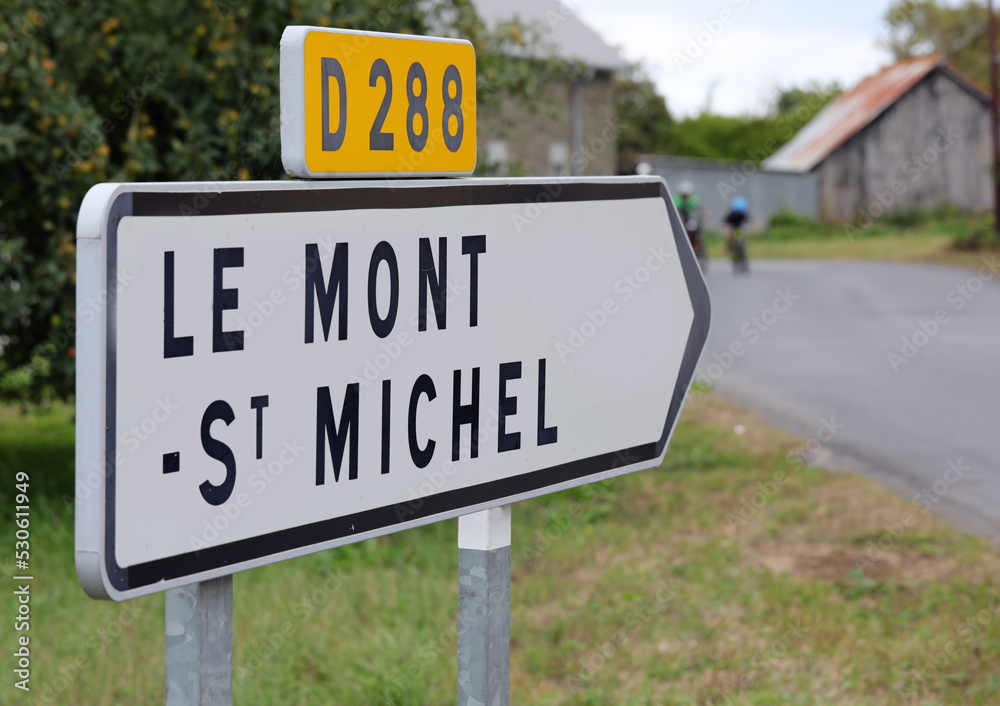 road signs with directions to the abbey of Mont Saint Michel in France