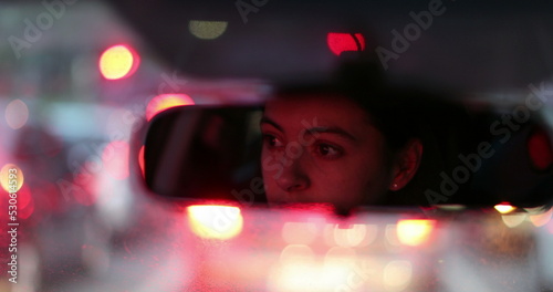 woman rearview mirror stuck in traffic