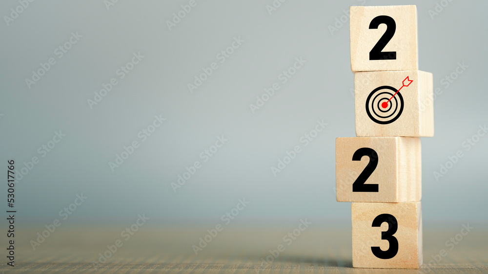 Start 2023 concept, 2023 years Target successful in wood cube for beginning new year for planning. background for the happy new years for text with copy space. Start 2023 concept, 2023 years Target successful in wood cube for beginning new year for planning. background for the happy new years for text with copy space.