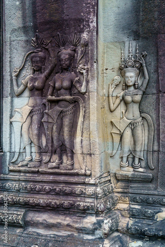 Cambodia. Siem Reap Province. A Devata sculpture in bas relief at Angkor Wat (Temple City). A Buddhist and temple complex in Cambodia and the largest religious monument in the world