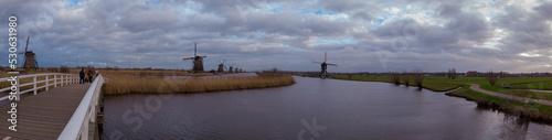 The windmills of Kinderdijk, in the province of South Holland, Netherlands. Nineteen beautiful windmills, built around 1740, stand here as part of a larger water management system to prevent floods.