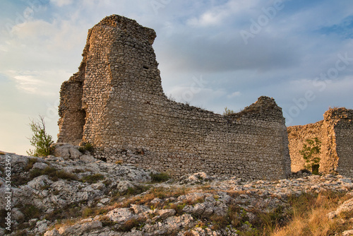 A ruin of castle Sirotci hradek in Moravia region, sunset light. photo