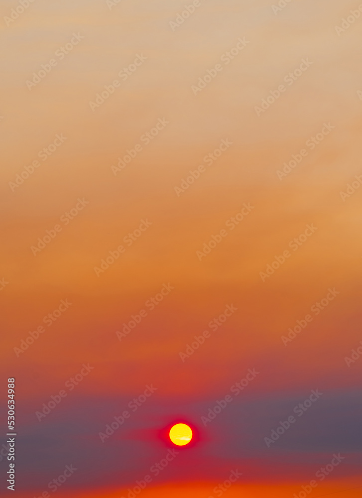 Clouds and sun in the yellow sky (beautiful summer sunset) Clouds and sun in the yellow sky (beautiful summer sunset)