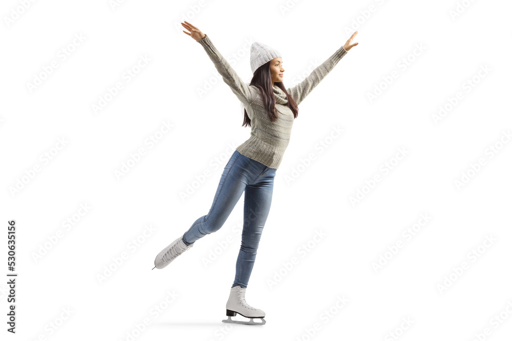 Full length shot of a young casual female ice skating