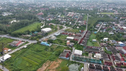 Aerial view of urban traffic lane in Road roundabout with car lots Wongwian Yai in Yala,Thailand.street large beautiful downtown plan, Top view of cityscape and transport highway