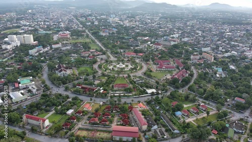 Aerial view of urban traffic lane in Road roundabout with car lots Wongwian Yai in Yala,Thailand.street large beautiful downtown plan, Top view of cityscape and transport highway