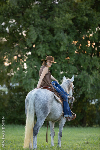 Cowgirl in Western Fashion photo