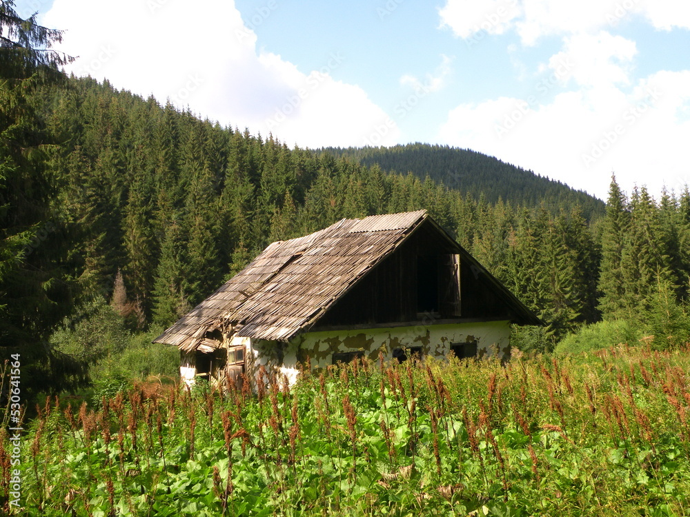 Abandoned old wooden house in the mountains Abandoned old wooden house in the mountains