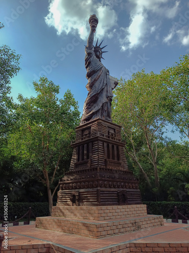 statue of liberty made with waste materials 