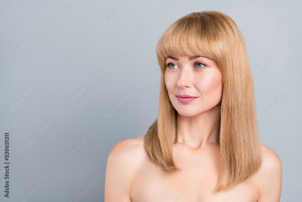 Photo of aesthetic lady look empty space spa salon treatment advertisement isolated over grey color background Photo of aesthetic lady look empty space spa salon treatment advertisement isolated over grey color background