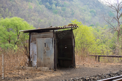 A view of an hut at mountain village Kalakund near Mhow, Indore, Madhya Pradesh on a sunny summer day. Indian village. photo