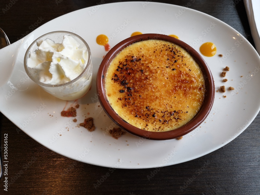 Gastronomic burned cream with whipped crea Gastronomic burned cream with whipped crea