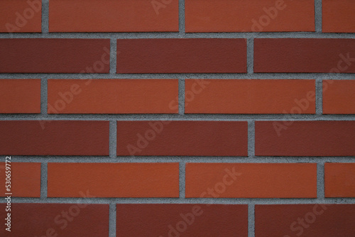 Tekstura, ściana z pomarańczowej i czerwonej cegły