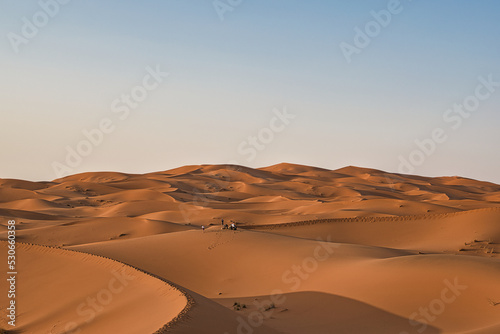 Dunes in the Sahara desert at sunset  the desert near the town of Merzouga  a beautiful African landscape