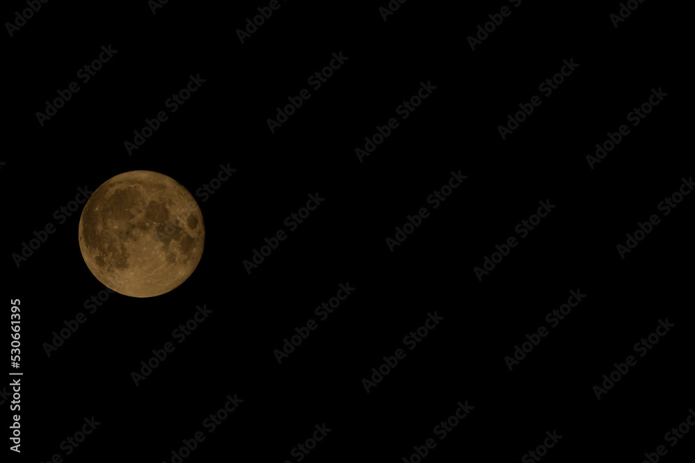 Fototapeta premium Full moon with black dark sky in summer hot night
