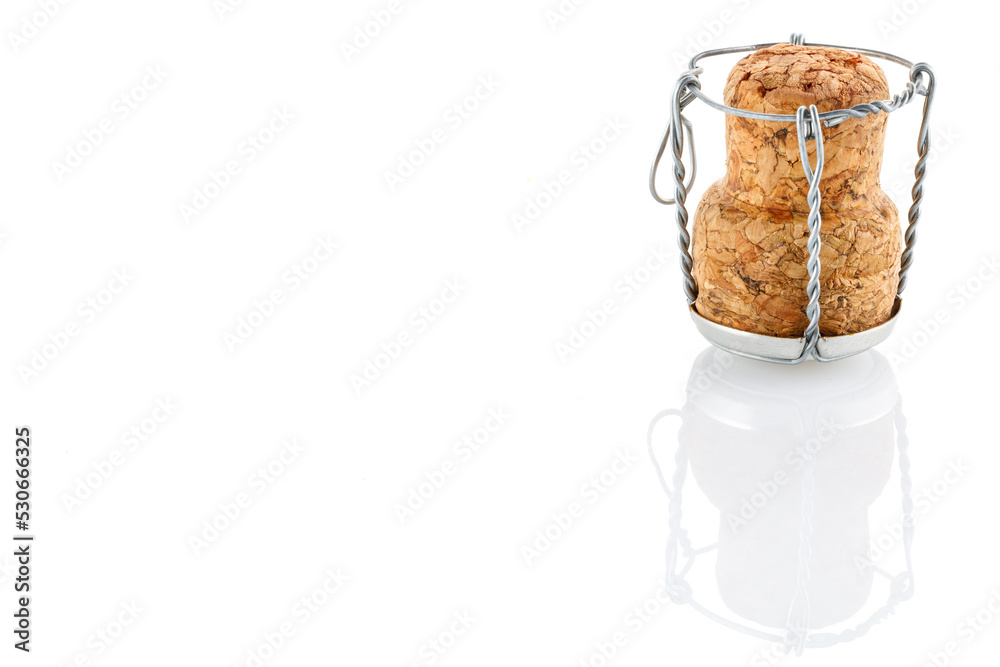 Cork from a bottle of champagne or sparkling wine, close-up photo of a cork isolated on a white background.