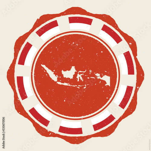 Indonesia vintage sign. Grunge round logo with a map and flags of Indonesia. Appealing vector illustration.