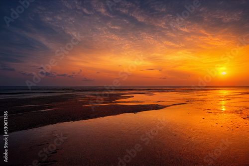 Beautiful beach sunset, colorful clouds and waves © Mikiehl Design