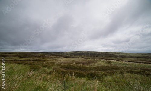 landscape of an irish mountain with gray clouds