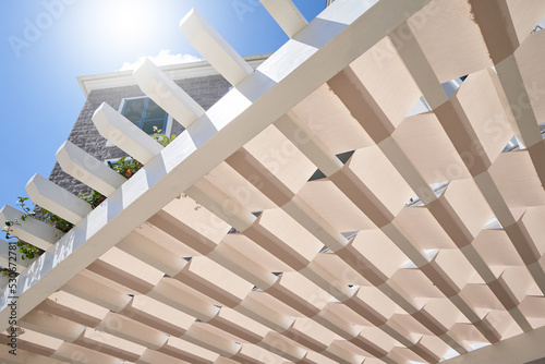 White wooden pergola roof for sun shade