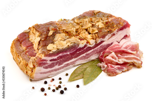 Smoked pork bacon with garlic and spices, isolated on white background.
