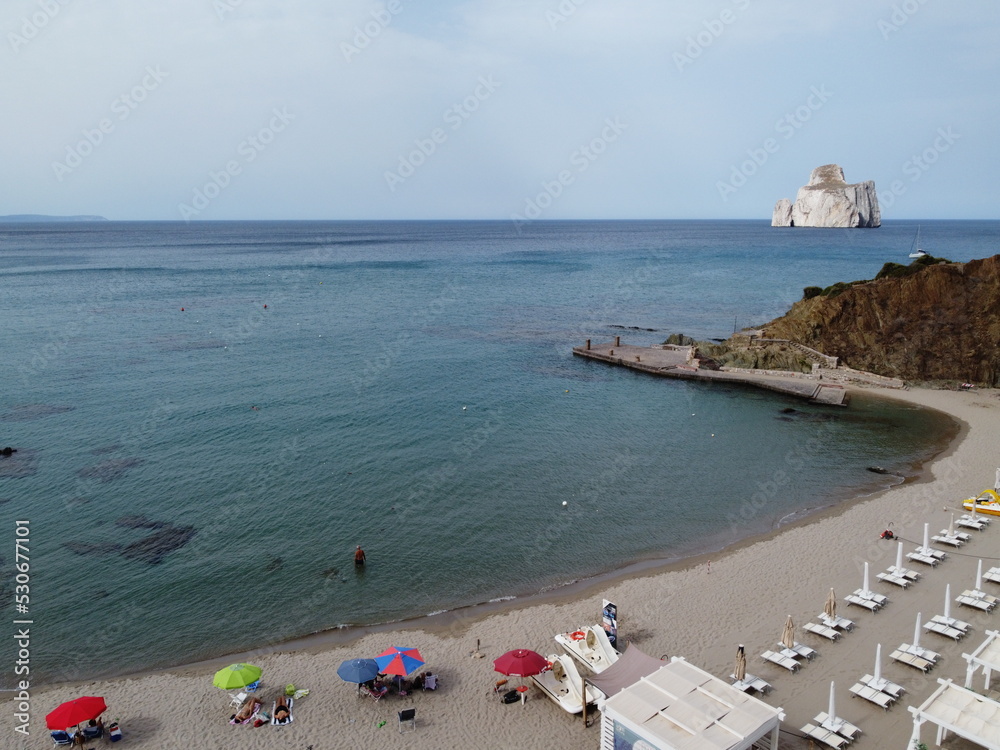 Obraz premium The sea of Masua beach, south Sardinia, with the 