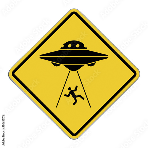 Diamond-shaped crossing sign with yellow background and black border with a black flying saucer abducting a man in the middle. photo