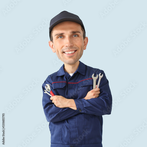 Funny car mechanic with big...
