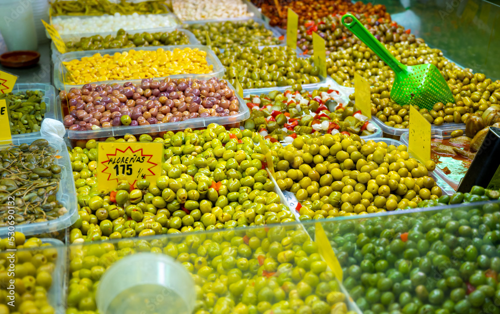 Assortment of pickled green olives on farmers market in Malaga, Andalusia, Spain Assortment of pickled green olives on farmers market in Malaga, Andalusia, Spain