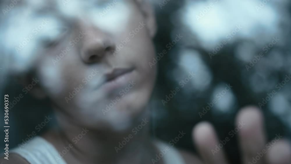 lonely depressed boy near the window, big inner experiences, difficult life experiences in early childhood