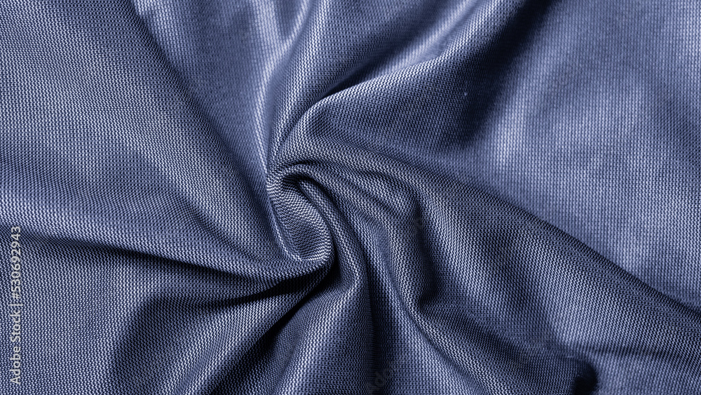 scheidender blauer drapierter Stoff scheidender blauer drapierter Stoff
