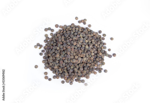 French or Puy Lentils in a Heap or Pile Isolated on White in a Top Down or Flat Lay View