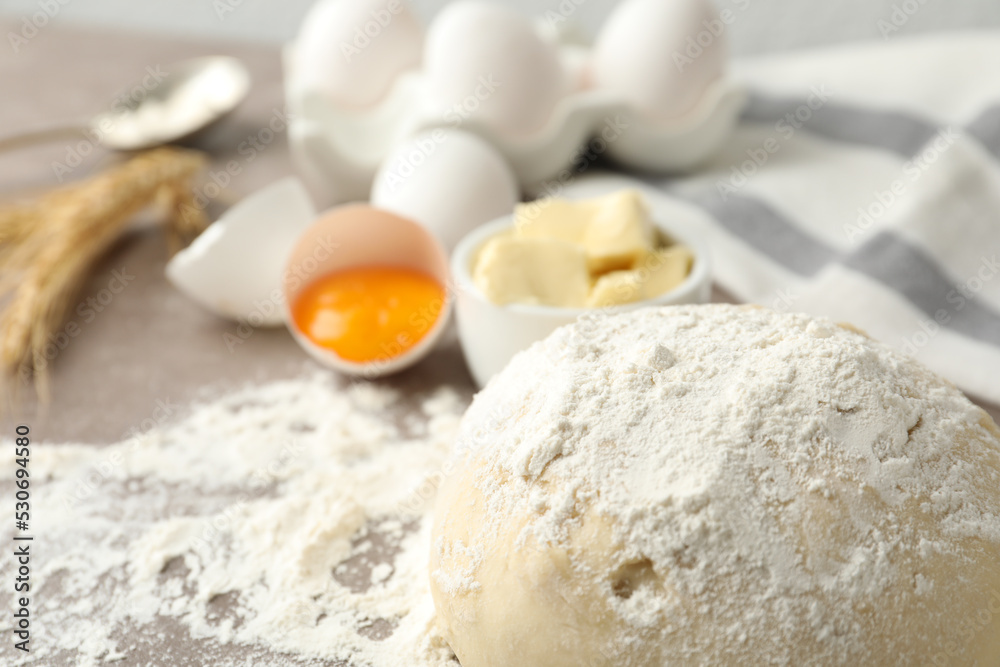 Wheat dough and products on table, closeup view with space for text. Cooking pastries Wheat dough and products on table, closeup view with space for text. Cooking pastries