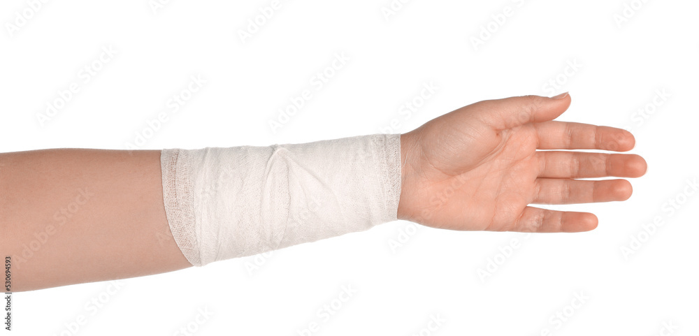 Woman with wrist wrapped in medical bandage on white background, closeup Woman with wrist wrapped in medical bandage on white background, closeup