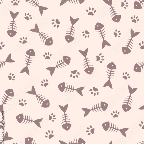 Animal seamless pattern with cat paw prints and fish skeleton