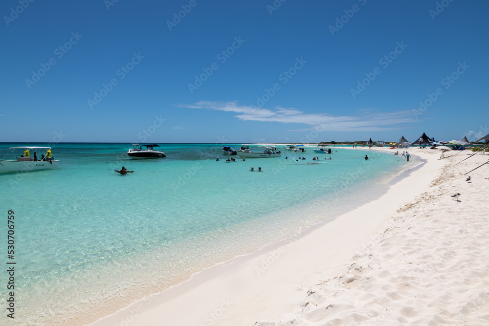 Cayo de Agua (Los Roques Archipelago), Venezuela, 07.30.2022: tropical white beach in the caribbean sea.