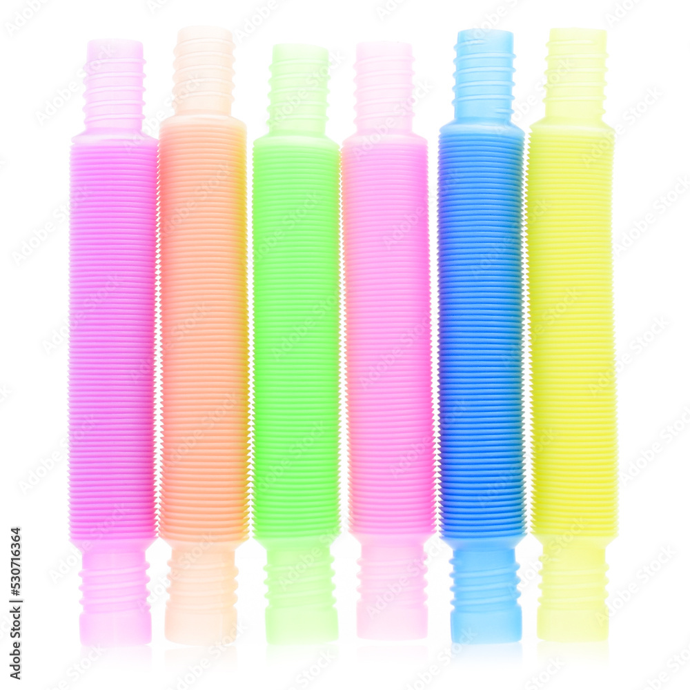 Pop tube isolated on a white background. A popular, sensory antistress toy. Corrugated tube for children. A new trend. Stress relief concept Pop tube isolated on a white background. A popular, sensory antistress toy. Corrugated tube for children. A new trend. Stress relief concept